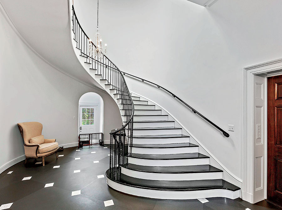 The sloping staircase in the Lake Forest estate