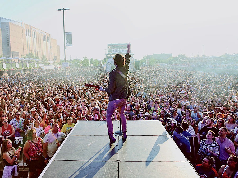 A performer on stage at the Windy City Smokeout