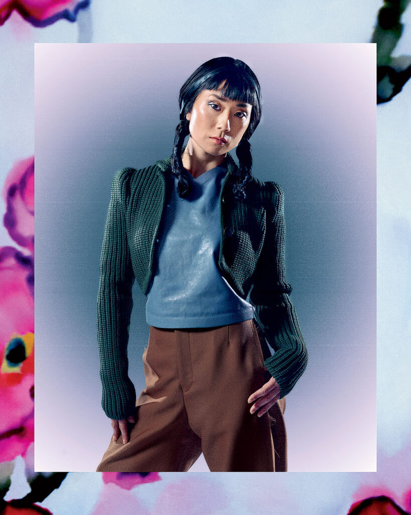 Mika Horibuchi wearing Loewe cropped cardigan, Marni leather top, and Undercover wool and polyester trousers