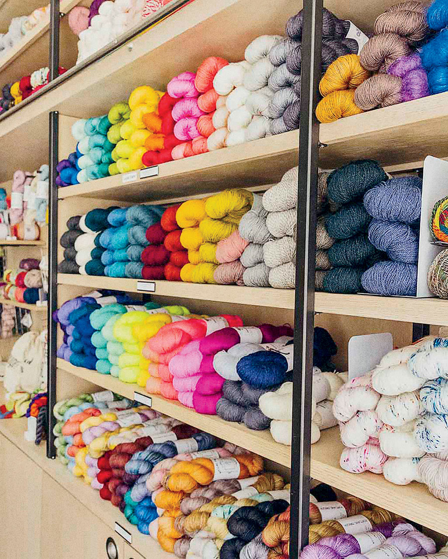 Shelves full of yarn at Nina