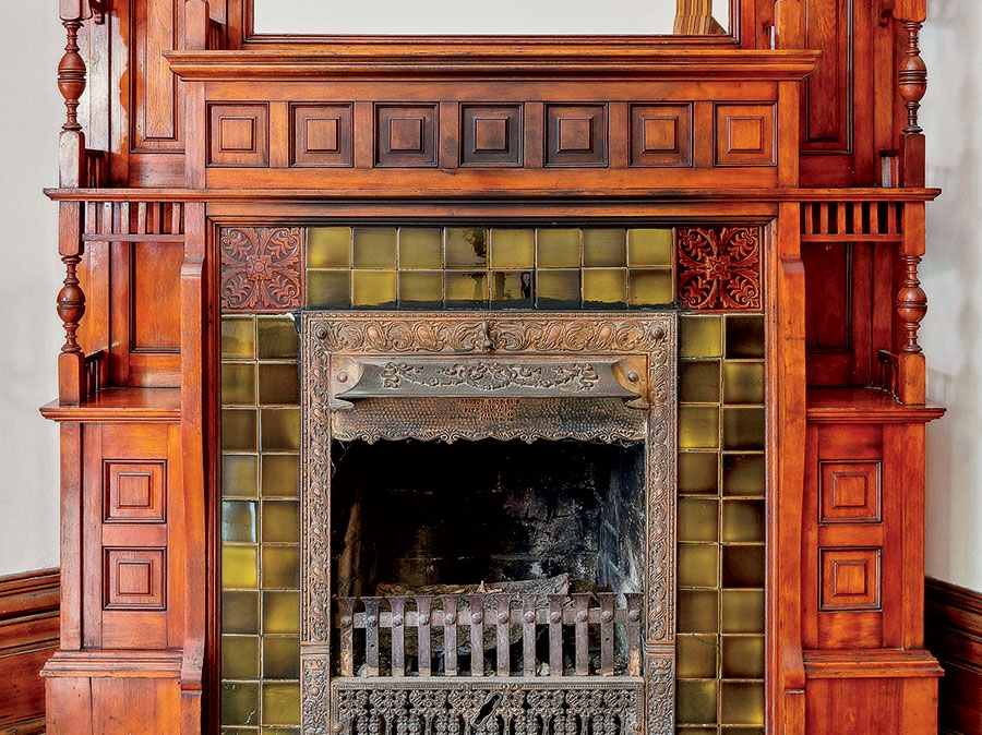 A highly ornamented fireplace in the Old Town home