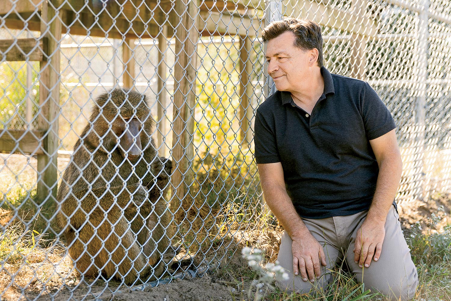 Scott Kubisch and Dyson the a baboon at Peaceable Primate Sanctuary