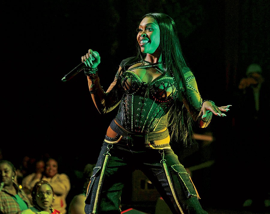 Tink performing at a concert