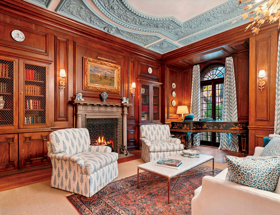 An ornately decorated room with a fireplace in 1515 North State Parkway